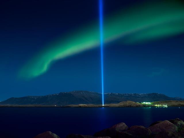Northern lights over Reykjavík and Imagine Peace Towe Northern lights over Reykjavík and Imagine Peace Tower