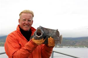 Captain Freyr with catfish