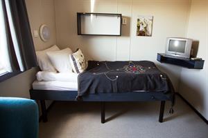 Single room with shared bathroom