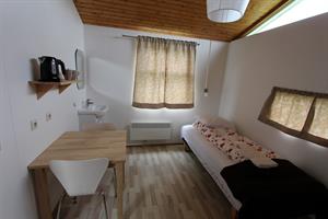 Room with shared bathroom