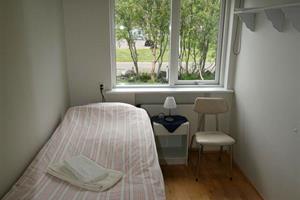 Single room with shared bathroom