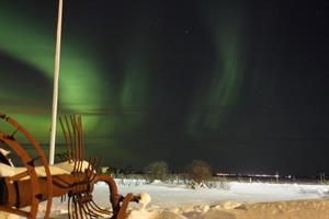 Northern lights dancing on the sky near Hotel Vos
