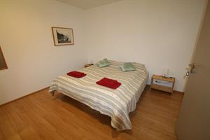 One out of two bedrooms of the apartment