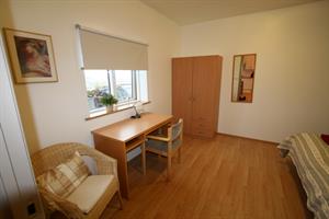 One out of two bedrooms of the apartment