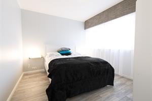 Bedroom with a double bed in the 7 person cottage