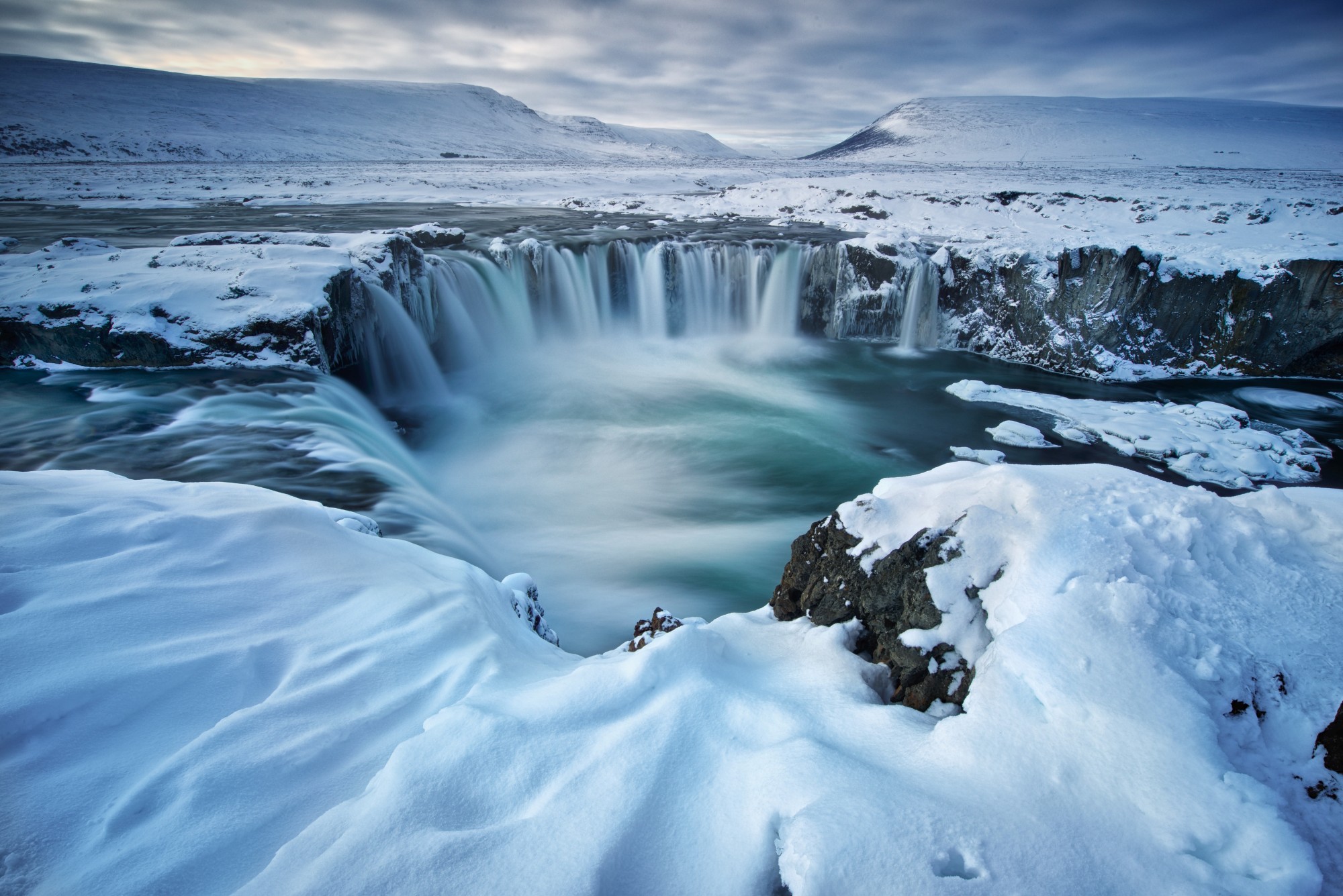 Goðafoss Waterfall under a blanket of snow Goðafoss Waterfall under a blanket of snow