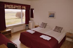 Triple room with shared bathroom