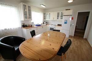 Kitchen in the house were guests share bathrooms