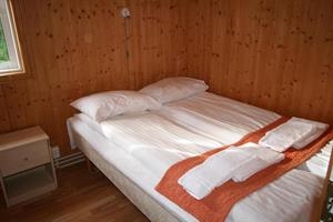 Double room with and additional sofa bed and private bathroom in a unit cottage