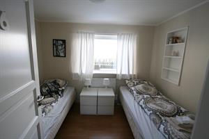 Twin room with shared bathroom