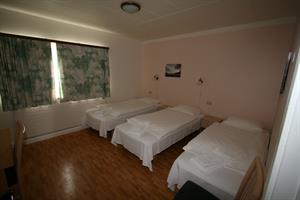 Triple room with shared bathroom