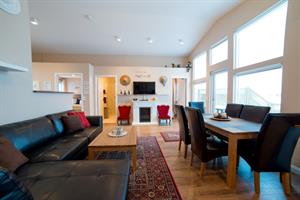 Living room with a fireplace in the 6 person cottage